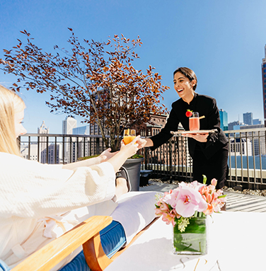 Spa Attendant Serving Smoothies